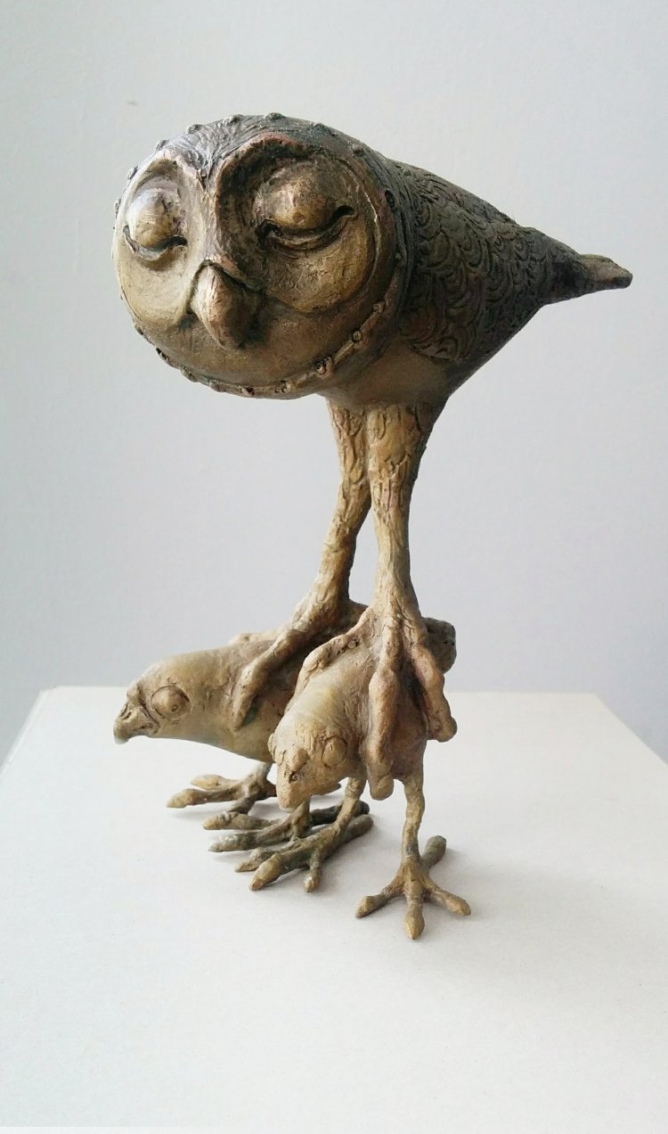 Owl on tiptoes