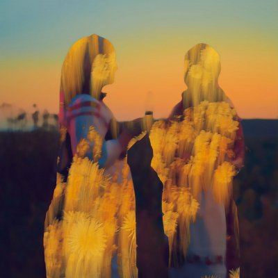 Two women in the field at sunset 3