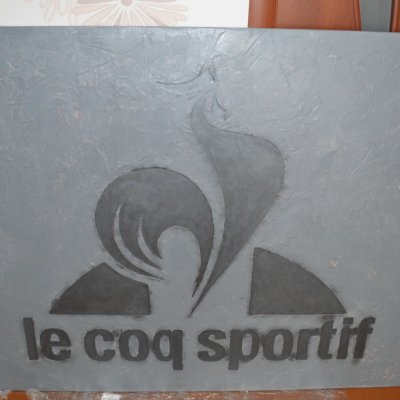 Панно "Le coq sportif"