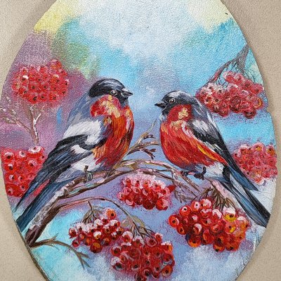 Bullfinches on mountain ash