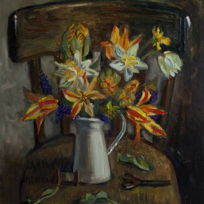 Still life with tulips on a chair