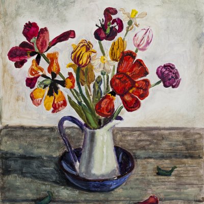 tulips in a white jug