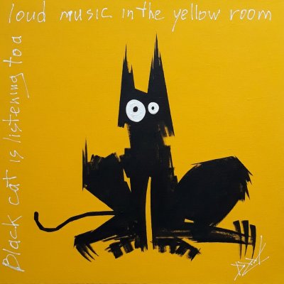 A black cat listens to loud music in the yellow room.