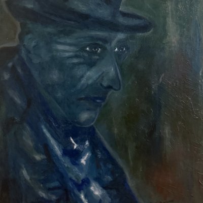 Portrait of an elderly man wearing a hat