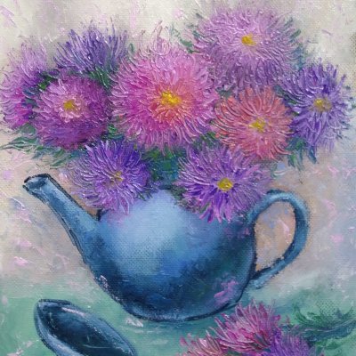 Flowers in a blue teapot
