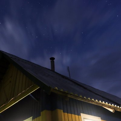 A village house and a slightly starry sky