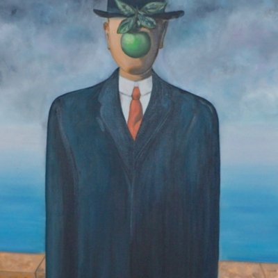 A copy of “Son of Man” by René Magritte
