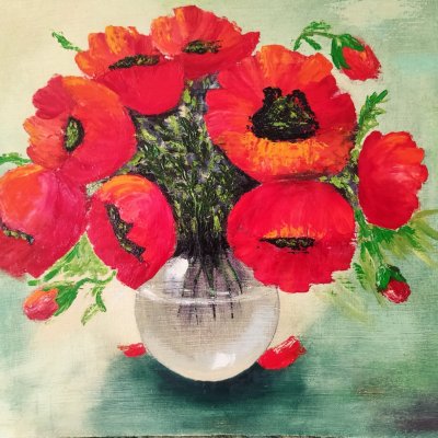 Poppies in a glass vase