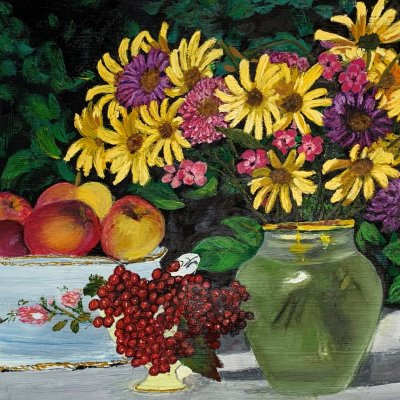 Yellow daisies and apples in a tureen