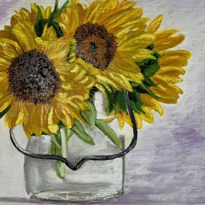 Sunflowers in a transparent bucket